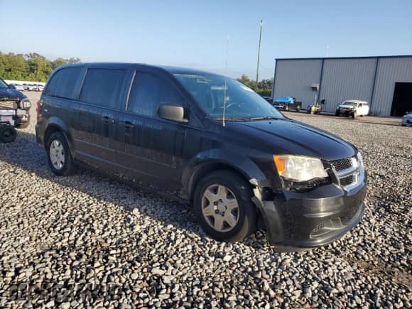 2013 Dodge Grand Caravan SE with VIN 2C4RDGBG1DR608040, listed as a Copart auction lot 85318475 with 107,927 mi miles and Salvage title. Bid and sale history available at DreamBid. Image 4.