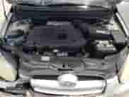 2007 Hyundai Accent SE z VIN KMHCN36C67U020057, wystawiony jako Copart lot #61012645 z przebiegiem 155 714 mil mil oraz Szkoda całkowita • Salvage title. Historia ofert i sprzedaży dostępna na DreamBid. Obrazek 11.