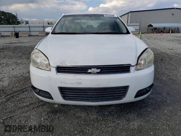 2006 Chevrolet Impala LT 3.9L with VIN 2G1WC581369259763, listed as a Copart auction lot 66530805 with 128,557 mi miles and Salvage title. Bid and sale history available at DreamBid. Image 5.