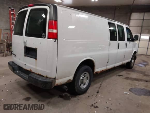 2012 Chevrolet Express Cargo with VIN 1GCWGGBA0C1100411, listed as a IAAI auction lot 41024219 with 197,251 mi miles and . Bid and sale history available at DreamBid. Image 4.