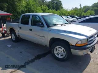 2001 Dodge Dakota Sport with VIN 1B7GL2AX11S118075, listed as a IAAI auction lot 42705551 with 363,644 mi miles and . Bid and sale history available at DreamBid. Image 1.