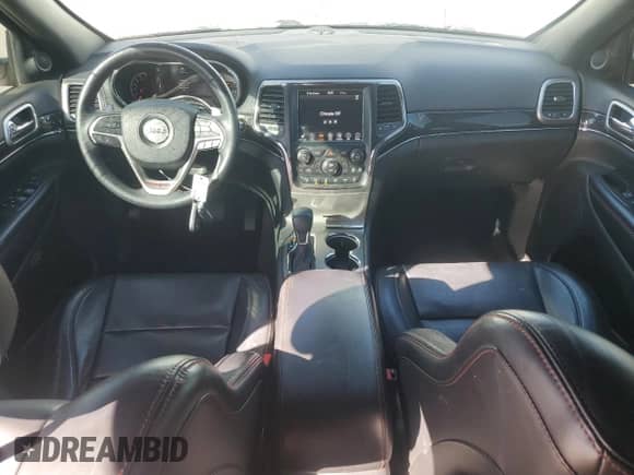 2018 Jeep Grand Cherokee Trailhawk с VIN 1C4RJFLT1JC263949, выставлен на аукционе Copart как лот 60560655 с пробегом 108 050 миль миль и Списание • Salvage title. История ставок и продаж доступна на DreamBid. Изображение 8.