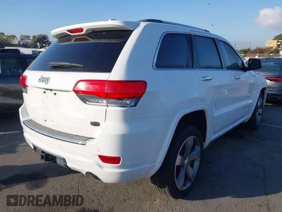 2015 Jeep Grand Cherokee Overland z VIN 1C4RJECG6FC848840, wystawiony jako IAAI lot #43513815 z przebiegiem 92 993 mil mil oraz . Historia ofert i sprzedaży dostępna na DreamBid. Obrazek 4.