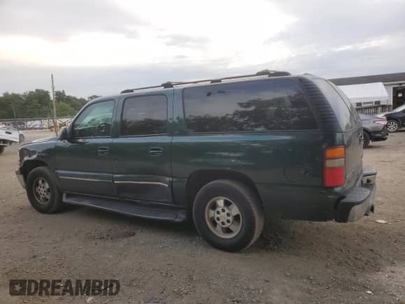 2001 Chevrolet Suburban LT с VIN 3GNEC16T71G182627, выставлен на аукционе Copart как лот 80062105 с пробегом Не указан миль и Списание • Salvage title. История ставок и продаж доступна на DreamBid. Изображение 2.