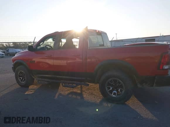 2018 Ram 1500 Rebel with VIN 1C6RR7YT8JS178952, listed as a IAAI auction lot 40514135 with 122,955 mi miles and . Bid and sale history available at DreamBid. Image 14.