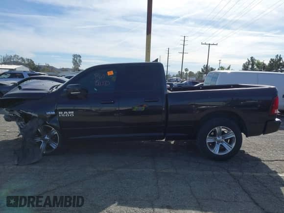 2014 Ram 1500 Sport with VIN 1C6RR6HTXES458906, listed as a IAAI auction lot 41411167 with Not provided miles and . Bid and sale history available at DreamBid. Image 14.