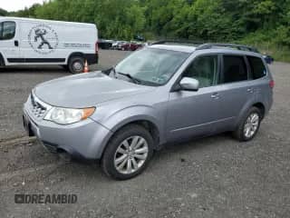 2011 Subaru Forester X Premium with VIN JF2SHADC8BH737819, listed as a Copart auction lot 63251755 with 144,679 mi miles and Clean title. Bid and sale history available at DreamBid. Image 1.