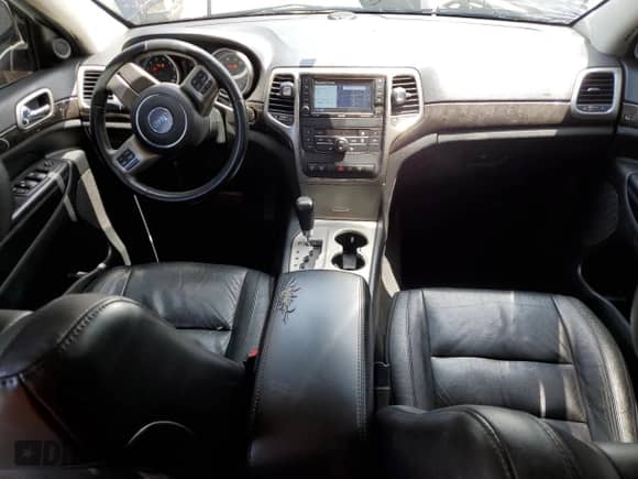 2012 Jeep Grand Cherokee Laredo с VIN 1C4RJEAT6CC301188, выставлен на аукционе Copart как лот 59602325 с пробегом 163 126 миль миль и Списание • Salvage title. История ставок и продаж доступна на DreamBid. Изображение 8.