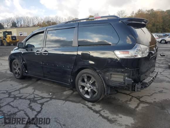 2015 Toyota Sienna SE with VIN 5TDXK3DC4FS557000, listed as a Copart auction lot 82646895 with 192,296 mi miles and Clean title. Bid and sale history available at DreamBid. Image 2.