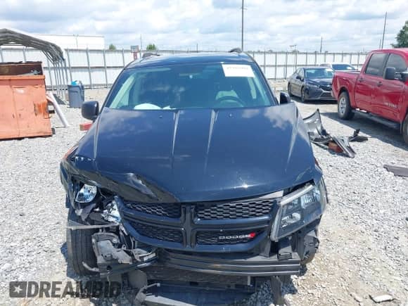 2018 Dodge Journey SE with VIN 3C4PDCAB0JT157987, listed as a IAAI auction lot 42995989 with 128,143 mi miles and . Bid and sale history available at DreamBid. Image 13.