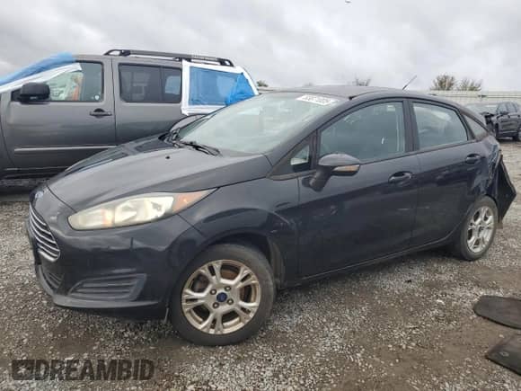 2015 Ford Fiesta SE with VIN 3FADP4BJ0FM163317, listed as a Copart auction lot 83871005 with 121,388 mi miles and Salvage title. Bid and sale history available at DreamBid. Image 1.