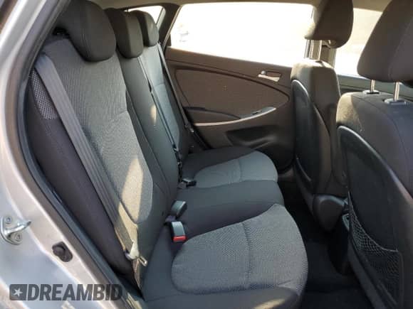 2013 Hyundai Accent GS z VIN KMHCT5AE4DU100415, wystawiony jako Copart lot #63779775 z przebiegiem 102 727 mil mil oraz Szkoda całkowita • Salvage title. Historia ofert i sprzedaży dostępna na DreamBid. Obrazek 10.