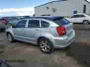 2010 Dodge Caliber SXT with VIN 1B3CB4HA4AD532374, listed as a Copart auction lot 80359355 with 229,209 mi miles and Salvage title. Bid and sale history available at DreamBid. Image 2.