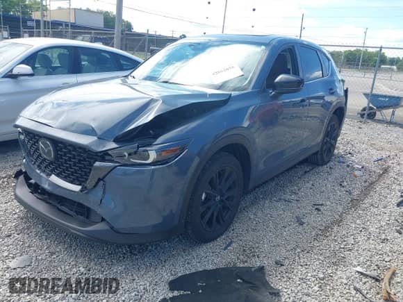 2022 Mazda CX-5 S Preferred z VIN JM3KFBCM1N0625605, wystawiony jako IAAI lot #42862055 z przebiegiem 34 472 mil mil oraz . Historia ofert i sprzedaży dostępna na DreamBid. Obrazek 2.