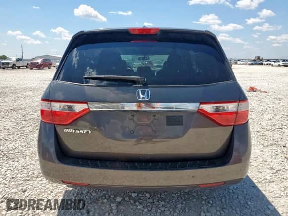 2013 Honda Odyssey EX-L с VIN 5FNRL5H62DB043461, выставлен на аукционе Copart как лот 71436245 с пробегом 179 934 миль миль и Списание • Salvage title. История ставок и продаж доступна на DreamBid. Изображение 6.