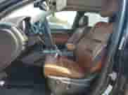 2012 Jeep Grand Cherokee Overland with VIN 1C4RJECG4CC354505, listed as a Copart auction lot 81052135 with 126,523 mi miles and Salvage title. Bid and sale history available at DreamBid. Image 7.