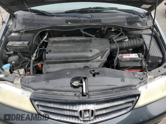 2004 Honda Odyssey LX with VIN 5FNRL18574B137609, listed as a Copart auction lot 68292805 with 172,873 mi miles and Salvage title. Bid and sale history available at DreamBid. Image 12.