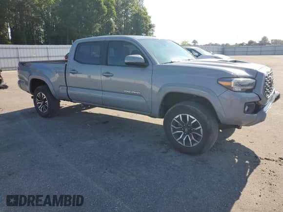 2021 Toyota Tacoma SR5 с VIN 5TFDZ5BN4MX056775, выставлен на аукционе Copart как лот 70674325 с пробегом 55 403 миль миль и Списание • Salvage title. История ставок и продаж доступна на DreamBid. Изображение 4.