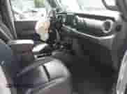 2023 Jeep Wrangler Sahara with VIN 1C4JJXP6XPW516832, listed as a IAAI auction lot 43140022 with 26,710 mi miles and . Bid and sale history available at DreamBid. Image 5.