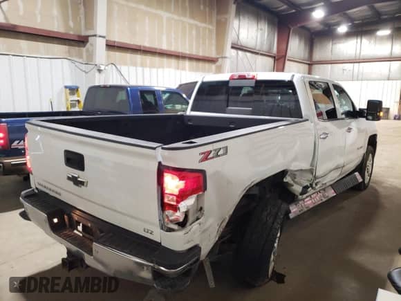 2018 Chevrolet Silverado 2500HD LTZ с VIN 1GC1KWEY1JF141092, выставлен на аукционе Copart как лот 84929695 с пробегом 91 035 миль миль и Списание • Salvage title. История ставок и продаж доступна на DreamBid. Изображение 3.