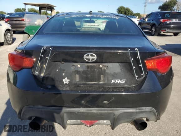 2014 Scion FR-S with VIN JF1ZNAA19E9702042, listed as a Copart auction lot 85503975 with 147,641 mi miles and Salvage title. Bid and sale history available at DreamBid. Image 6.