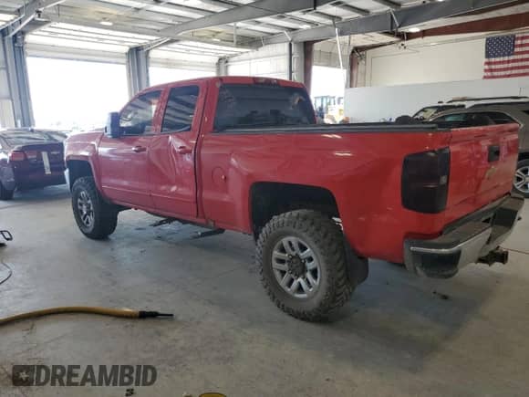 2016 Chevrolet Silverado 2500HD LT with VIN 1GC2KVEG1GZ158035, listed as a Copart auction lot 63641055 with 205,055 mi miles and Salvage title. Bid and sale history available at DreamBid. Image 2.