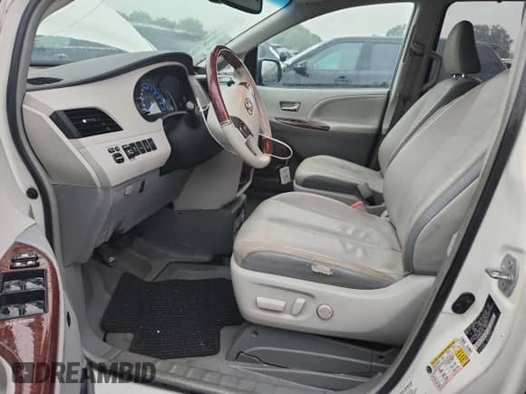 2013 Toyota Sienna XLE with VIN 5TDYK3DC2DS371005, listed as a Copart auction lot 70303375 with 92,927 mi miles and Clean title. Bid and sale history available at DreamBid. Image 7.