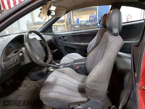 1999 Chevrolet Cavalier z VIN 1G1JC1243X7198469, wystawiony jako Copart lot #78077684 z przebiegiem Nie podano mil oraz Szkoda całkowita • Salvage title. Historia ofert i sprzedaży dostępna na DreamBid. Obrazek 7.