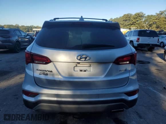 2018 Hyundai Santa Fe 2.4L с VIN 5XYZU3LB6JG555881, выставлен на аукционе Copart как лот 86409215 с пробегом 180 601 миль миль и Чистый • Clean title. История ставок и продаж доступна на DreamBid. Изображение 6.
