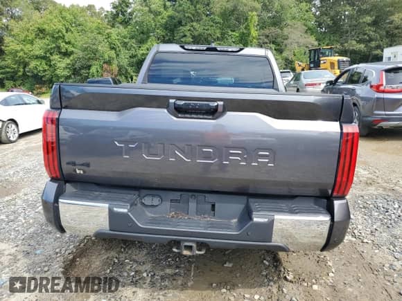 2022 Toyota Tundra SR5 with VIN 5TFLA5DB5NX033867, listed as a Copart auction lot 71695995 with 27,102 mi miles and Salvage title. Bid and sale history available at DreamBid. Image 6.