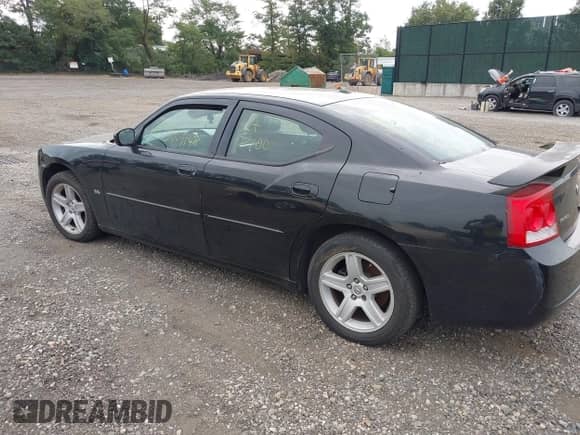 2010 Dodge Charger SXT z VIN 2B3CA3CV6AH245936, wystawiony jako IAAI lot #43221438 z przebiegiem Nie podano mil oraz . Historia ofert i sprzedaży dostępna na DreamBid. Obrazek 3.