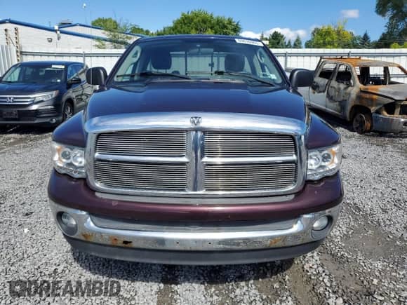 2004 Dodge 1500 SLT z VIN 1D7HU16D94J252147, wystawiony jako Copart lot #69676965 z przebiegiem 203 830 mil mil oraz Szkoda całkowita • Salvage title. Historia ofert i sprzedaży dostępna na DreamBid. Obrazek 5.