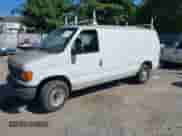 2005 Ford Econoline Cargo with VIN 1FTRE14W85HA52580, listed as a IAAI auction lot 43082316 with 188,115 mi miles and . Bid and sale history available at DreamBid. Image 2.