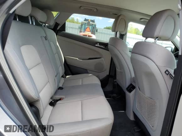 2018 Hyundai Tucson Limited with VIN KM8J3CA27JU677582, listed as a Copart auction lot 69106765 with 99,346 mi miles and Salvage title. Bid and sale history available at DreamBid. Image 11.