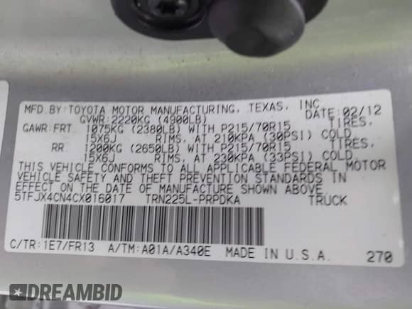2012 Toyota Tacoma with VIN 5TFJX4CN4CX016017, listed as a IAAI auction lot 42416542 with 116,900 mi miles and . Bid and sale history available at DreamBid. Image 9.