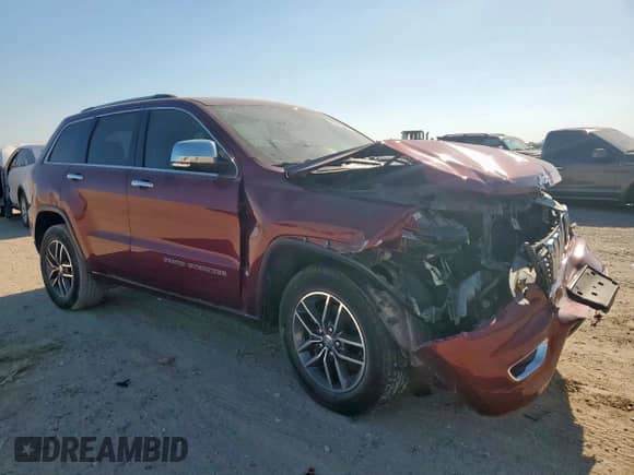 2018 Jeep Grand Cherokee Limited with VIN 1C4RJEBG3JC131032, listed as a Copart auction lot 82510835 with 142,671 mi miles and Clean title. Bid and sale history available at DreamBid. Image 4.