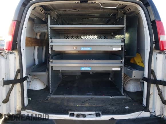 2018 Chevrolet Express Cargo с VIN 1GCWGAFP6J1184937, выставлен на аукционе Copart как лот 70963545 с пробегом 151 544 миль миль и Чистый • Clean title. История ставок и продаж доступна на DreamBid. Изображение 10.