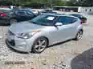2012 Hyundai Veloster w/Red Int z VIN KMHTC6AD2CU061478, wystawiony jako IAAI lot #43104434 z przebiegiem 216 113 mil mil oraz . Historia ofert i sprzedaży dostępna na DreamBid. Obrazek 2.