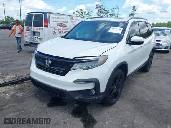 2021 Honda Pilot Black Edition z VIN 5FNYF6H71MB033733, wystawiony jako IAAI lot #42769044 z przebiegiem 56 060 mil mil oraz . Historia ofert i sprzedaży dostępna na DreamBid. Obrazek 2.