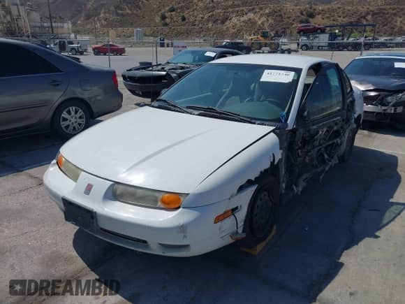 2002 Saturn SL с VIN 1G8ZH52802Z154555, выставлен на аукционе IAAI как лот 42771346 с пробегом 248 496 миль миль и . История ставок и продаж доступна на DreamBid. Изображение 2.