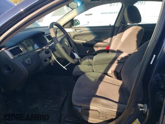 2010 Chevrolet Impala Police Police with VIN 2G1WD5EM1A1259652, listed as a Copart auction lot 42227965 with 128,396 mi miles and Salvage title. Bid and sale history available at DreamBid. Image 7.