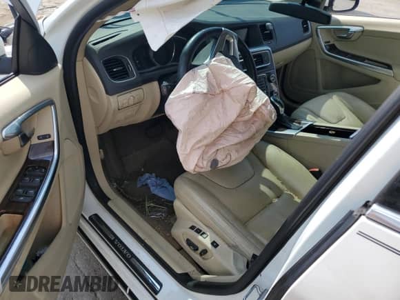 2014 Volvo S60 T5 с VIN YV1612FS6E1295211, выставлен на аукционе Copart как лот 68527425 с пробегом Не указан миль и Списание • Salvage title. История ставок и продаж доступна на DreamBid. Изображение 8.