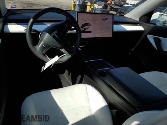 2021 Tesla Model Y Long Range с VIN 5YJYGDEE2MF243701, выставлен на аукционе Copart как лот 81344595 с пробегом 50 095 миль миль и Списание • Salvage title. История ставок и продаж доступна на DreamBid. Изображение 8.