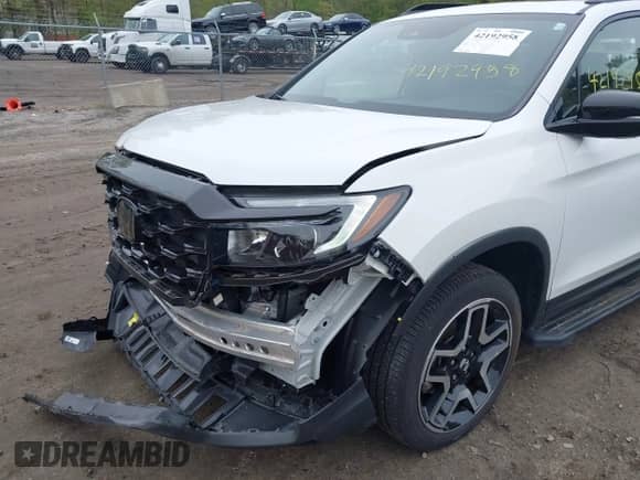 2023 Honda Passport Elite z VIN 5FNYF8H00PB022743, wystawiony jako IAAI lot #42192958 z przebiegiem 25 165 mil mil oraz . Historia ofert i sprzedaży dostępna na DreamBid. Obrazek 6.
