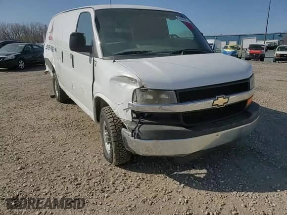2014 Chevrolet Express Cargo z VIN 1GCZGTBG9E1156330, wystawiony jako Copart lot #51582405 z przebiegiem Nie podano mil oraz Szkoda całkowita • Salvage title. Historia ofert i sprzedaży dostępna na DreamBid. Obrazek 11.
