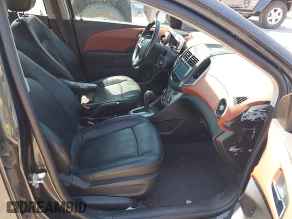 2015 Chevrolet Sonic LTZ with VIN 1G1JE5SB8F4191520, listed as a IAAI auction lot 43002537 with 82,395 mi miles and . Bid and sale history available at DreamBid. Image 5.