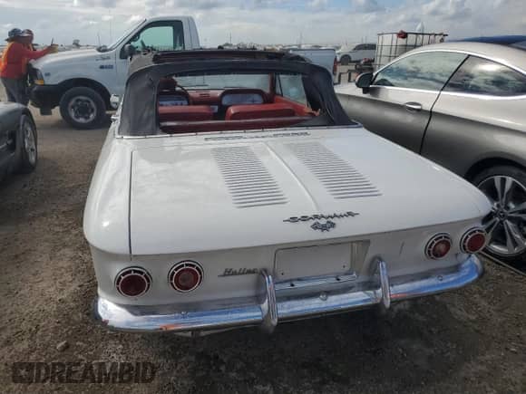 1962 Chevrolet Corvair z VIN 20967W317159, wystawiony jako Copart lot #79033794 z przebiegiem 2 532 mil mil oraz Nie do naprawy • Non repairable. Historia ofert i sprzedaży dostępna na DreamBid. Obrazek 6.