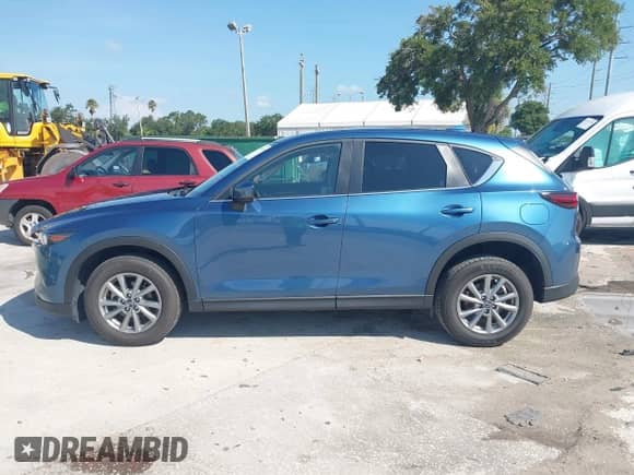 2023 Mazda CX-5 S Carbon Edition z VIN JM3KFBCM6P0112207, wystawiony jako IAAI lot #42747977 z przebiegiem 33 488 mil mil oraz . Historia ofert i sprzedaży dostępna na DreamBid. Obrazek 14.