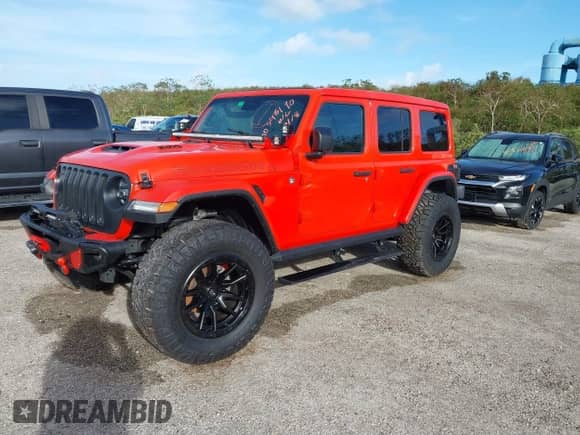 2023 Jeep Wrangler Rubicon 20th Anniversary with VIN 1C4JJXSJ1PW652861, listed as a IAAI auction lot 40546190 with Not provided miles and . Bid and sale history available at DreamBid. Image 2.