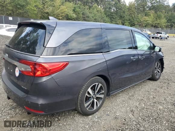2020 Honda Odyssey Elite with VIN 5FNRL6H9XLB031816, listed as a Copart auction lot 85384185 with 69,706 mi miles and Salvage title. Bid and sale history available at DreamBid. Image 3.